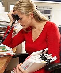 woman paperwork frustrated 300