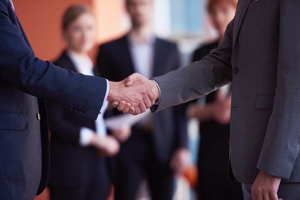 business partners, partnership concept with two businessman handshake (1)